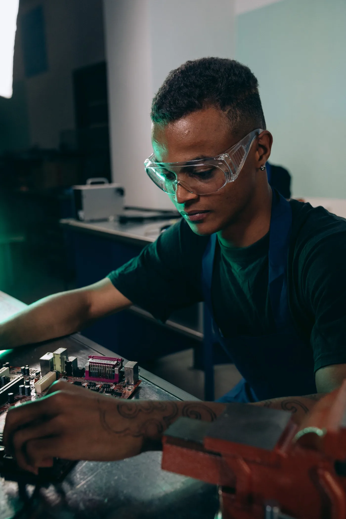 Electronics engineer working at a hardware bench